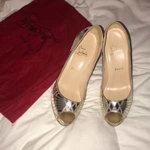 Christian Louboutin “Very Galaxy” mirrored pumps